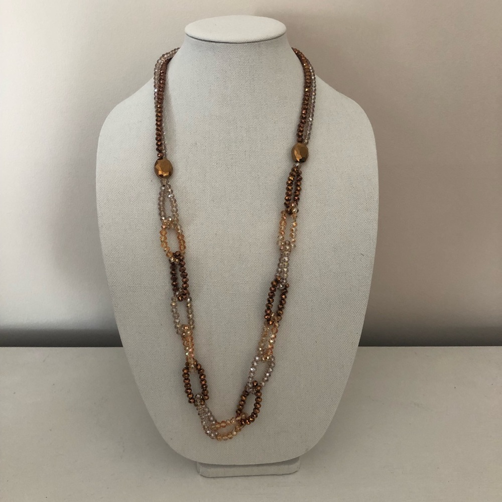 Long crystal necklace in neutral tones